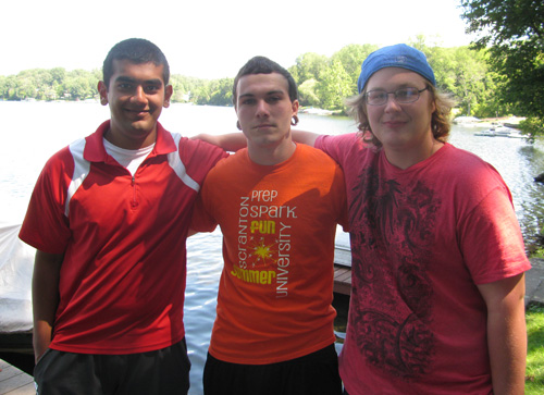 From left, previous SPARK participants Jamil Islam, a senior at Scranton High School, Justin Marrero, a junior at Scranton High School, and Raymond Harty, a junior at West Scranton High School, return to the University’s Retreat Center at Chapman Lake to help on the last day of the free, week-long summer camp.